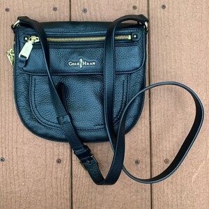 Cole Haan black leather cross body bag with gold zippers, excellent condition